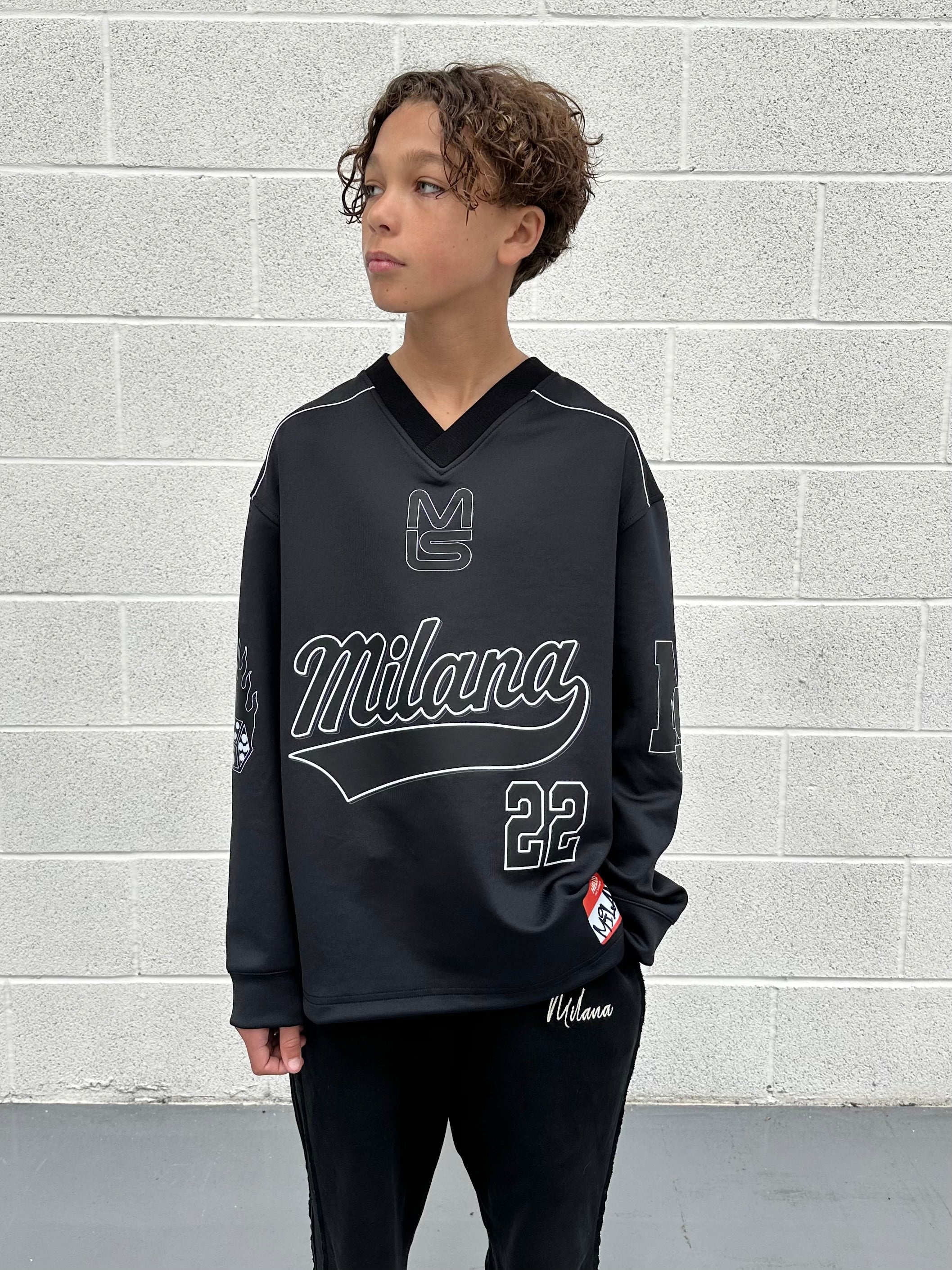 Black Rola Kids Long Sleeve Jersey.